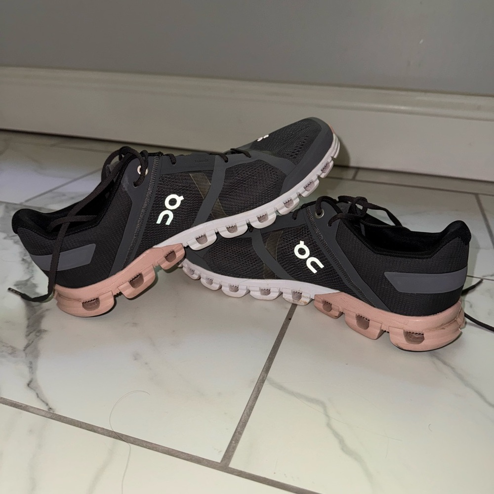 On Running Black and Pink Athletic Shoes with Cloud Cushioning
